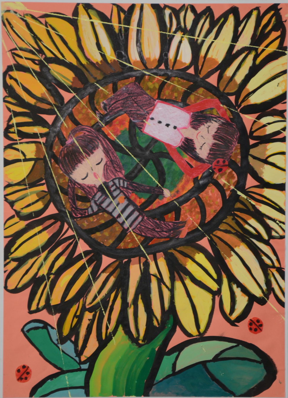 ひまわりの上でスヤスヤ・・・